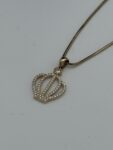 Prachtige 14 karaat ketting met kroon hanger 45 cm